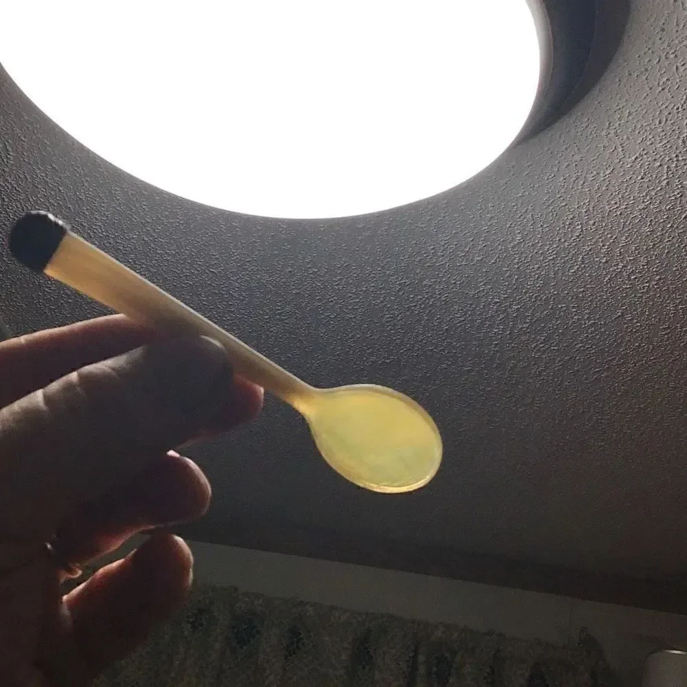Vintage translucent baby / caviar spoon with sterling silver top